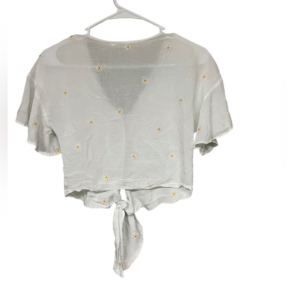 Lush White Top with Floral Accents - Picture 2 of 3